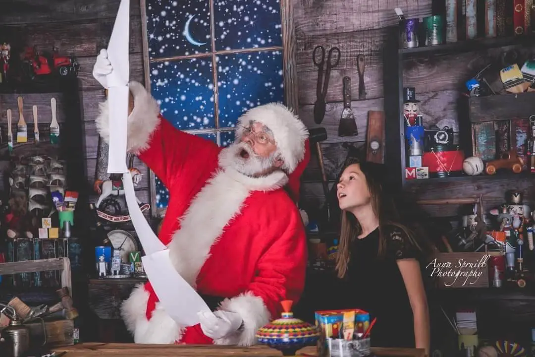 Santa reading list with a child. Santa reading list with a child.