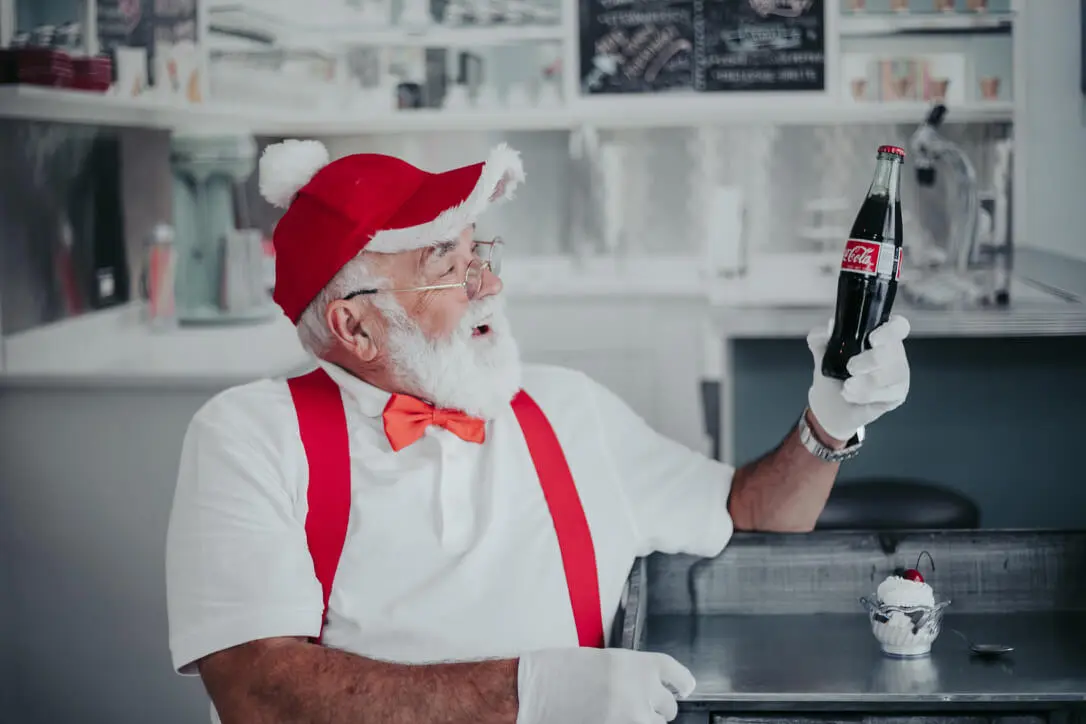 Elderly man with Coca-Cola in diner. Elderly man with Coca-Cola in diner.